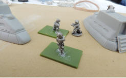 Vehicles assembled and figures with bases cut off