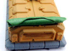 Brigade British vehicles with Ainsty mesh baskets and greenstuff putty tarps plus some spares box items