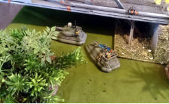 Shamont medium tanks hide under the bridge