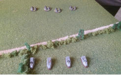 Slammers combat cars and command car with infantry back up