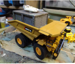 Mine Dump truck text fitting the shipping container and a turret
