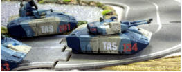 TAS HSAG13 ank leads an HSAG16 APC and an HSAG21 Command Vehicle
