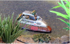 Slammers up-armoured combat car skims accross the open water