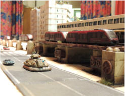 Regular Army MICV (GZG) advances past the station (model railway on Lego with Antenocitie detailing)