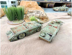 Two M577 vehicles