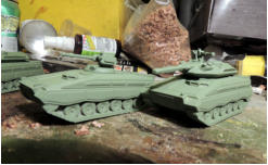 The Sokol (Falcon) MICV and the Xaoc (Havoc) medium tank in green primer