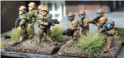 Infantry squad with coil-gun assault rifles and Assault squad with rifles and Support weapon in full armour