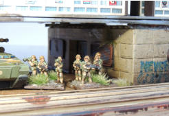 Infantry squad and Tankhunters with Buzzbombs and coil-gun assault rifles and Support weapon