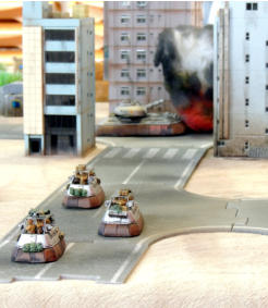 The Slammers lose a Blower to infantry fire from the high-rise building