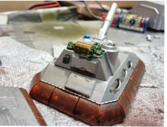 The rear stowage with Brigade metal stowage and putty tarp on the roof, all inked