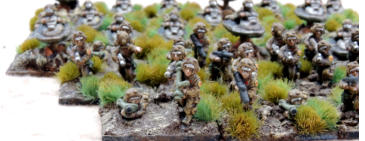 Close up of infantry with buzzbombs and grenade launchers to the front