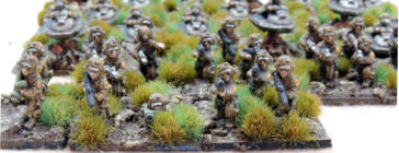 Close up of infantry with buzzbombs and grenade launchers to the front