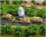Stewart forces move past a burning Hiroseki AFV (Brigade)